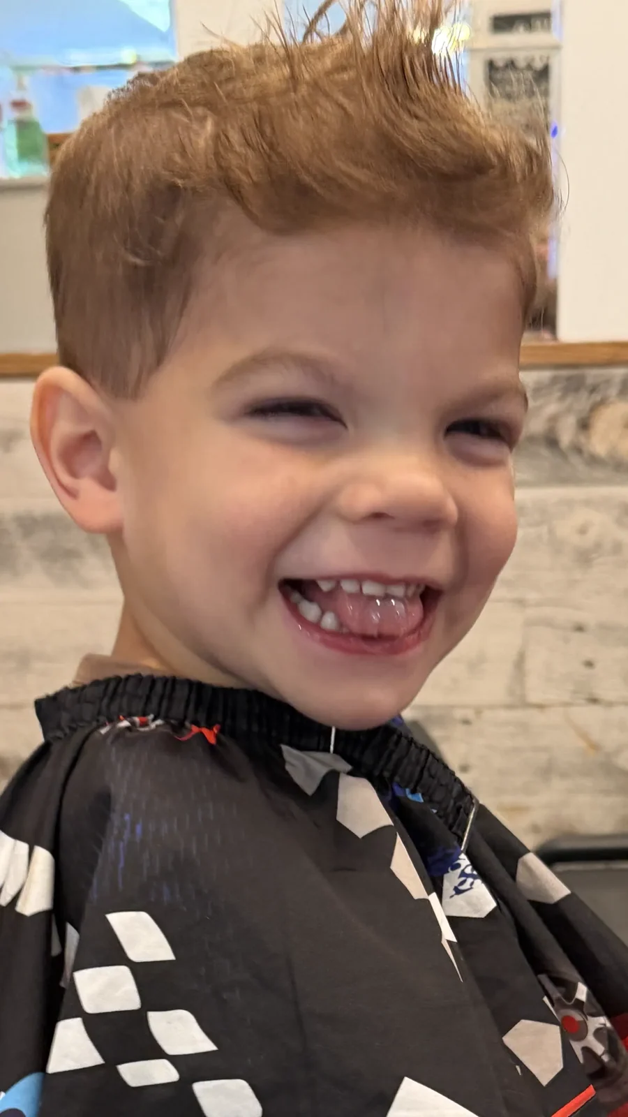 All smiles once the cape comes off